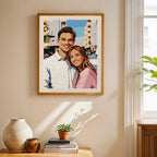 Framed mosaic artwork of a couple on a wall in a home setting.