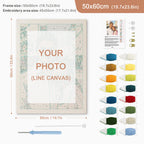 Embroidery kit with frame, thread colors, and needle on a white background