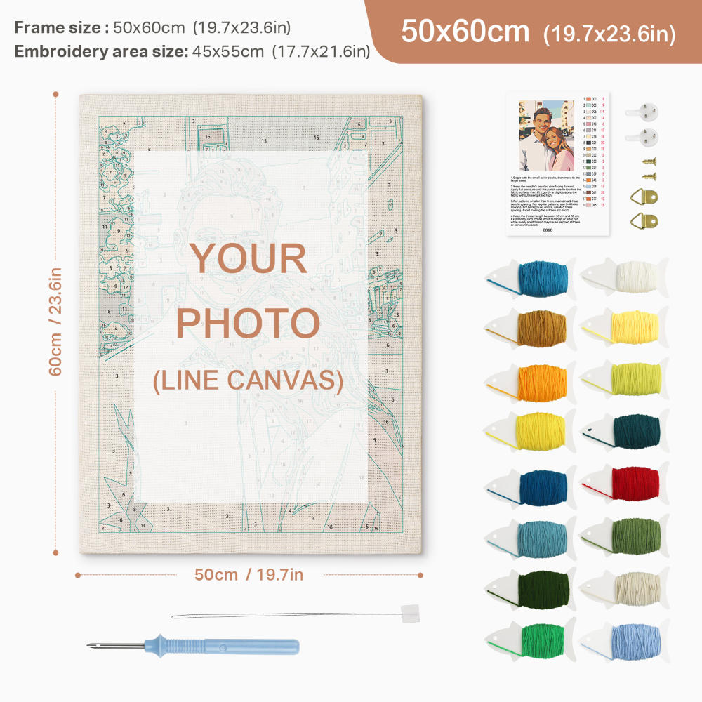 Embroidery kit with frame, thread colors, and needle on a white background
