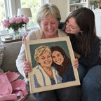 Mom with her custom punch needle portrait made from a family photo